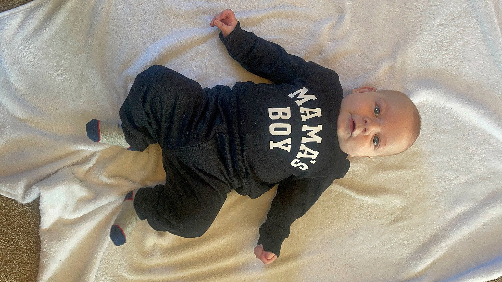 Luke joined the competition — help win amazing prizes! baby, baby_products, baby_toddler_clothing, child, comfort, elbow, finger, flooring, gesture, knee, linens, person, product, room, sitting, sleeve, sportswear, t_shirt, thigh, toddler