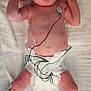 baby, infant, medical_equipment, hospital, monitoring_wires, nasal_cannula, diaper, bed, skin, newborn, healthcare, patient, hospital_bed, medical_care, person, lying_down, wrinkled_skin, head, hand, foot