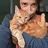 Miela a rejoint le concours — aidez-le/la à gagner de superbes lots ! casual_clothing, cat, cuddling, feline, fluffy, ginger_fur, green_eyes, holding, home, human_face, indoor, long_sleeves, orange_cat, person, pet, pointed_ears, portrait, relaxed, selfie, whiskers
