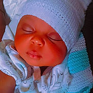 Samantha joined the competition — help win amazing prizes! baby, sleeping, hat, knitwear, blanket, hand, infant, cozy, soft_light, closeup, cute, peaceful, child, portrait, resting, warm, sleep, newborn, clothing, indoors