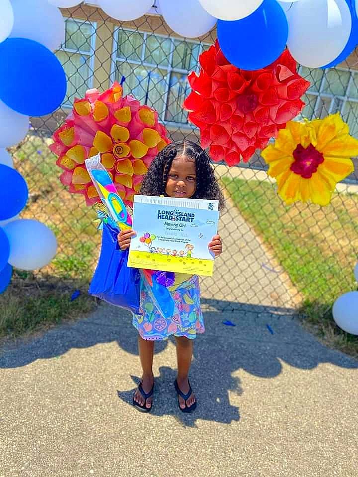 Royalty joined the competition — help win amazing prizes! automotive_wheel_system, balloon, blue, child, electric_blue, event, flower, fun, grass, happy, leisure, party_supply, person, pink, plant, pole, public_space, recreation, sky, summer