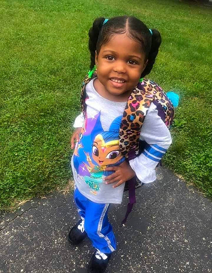 Royalty is registered to the contest to win money with this photo: baby_toddler_clothing, child, electric_blue, eye, face, fun, grass, hair, happy, head, human_body, iris, joy, leisure, people_in_nature, person, plant, recreation, smile, textile