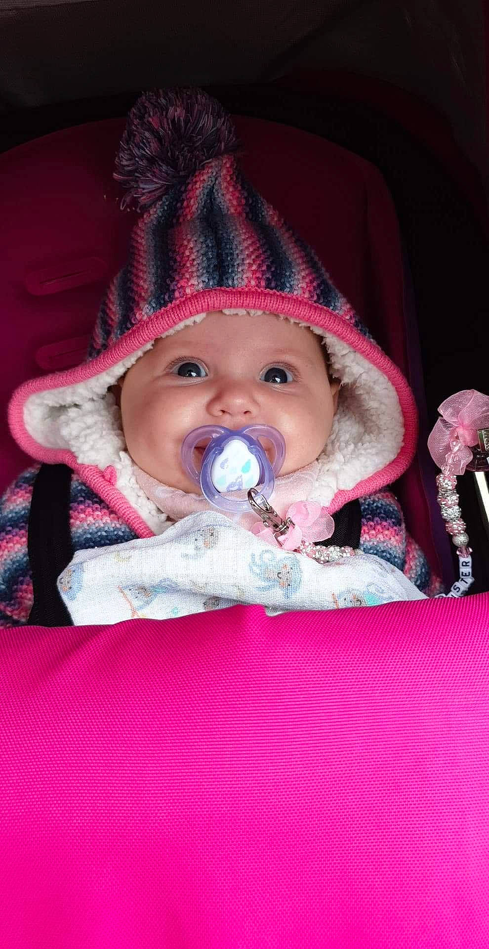 Alisha is registered to the contest to win money with this photo: baby, baby_products, cheek, child, fun, hat, joy, mouth, person, pink, product, smile, toddler