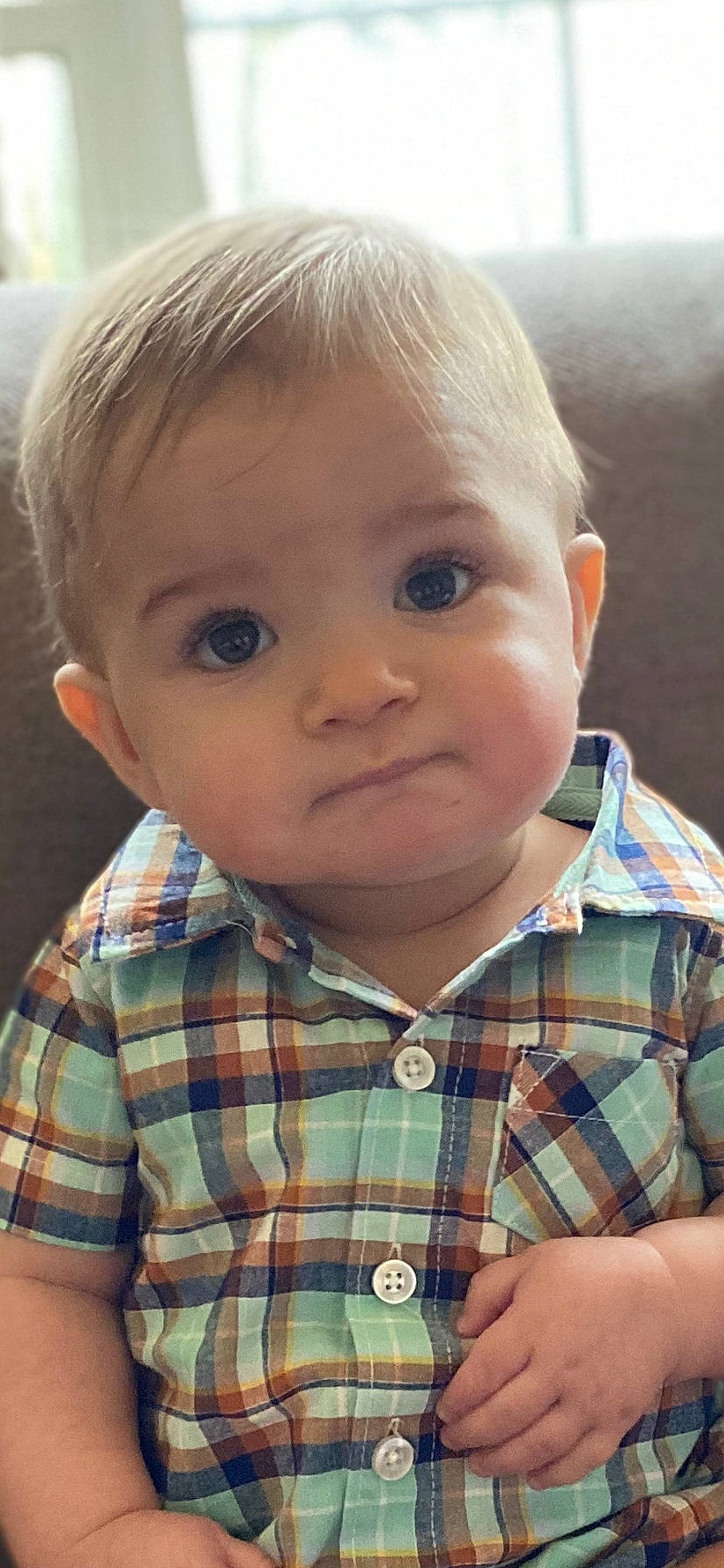 Granger is registered to the contest to win money with this photo: baby, blond, cheek, child, chin, design, eye, face, forehead, hair, head, iris, lip, nose, pattern, person, plaid, portrait, skin, tartan