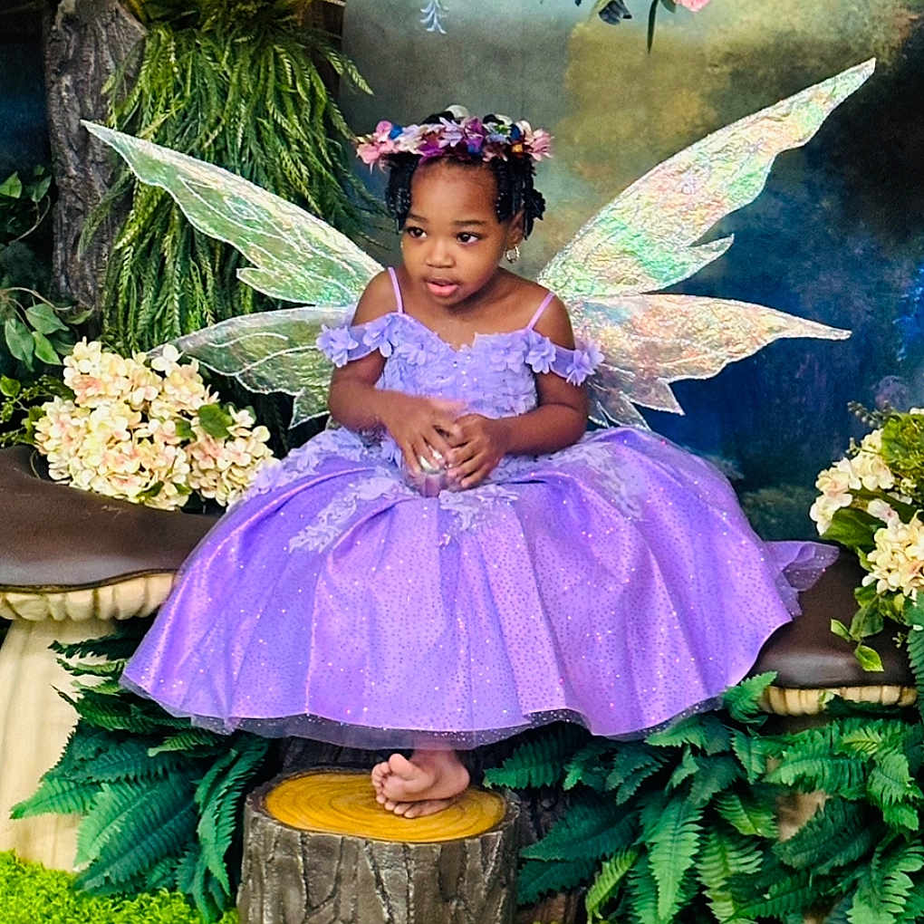 Trenity Benefield joined the competition — help win amazing prizes! child, clothing, costume, dress, face, female, flower, flowerarrangement, flowerbouquet, girl, head, leaf, person, petal, photography, plant, portrait, pottedplant, purple, tree