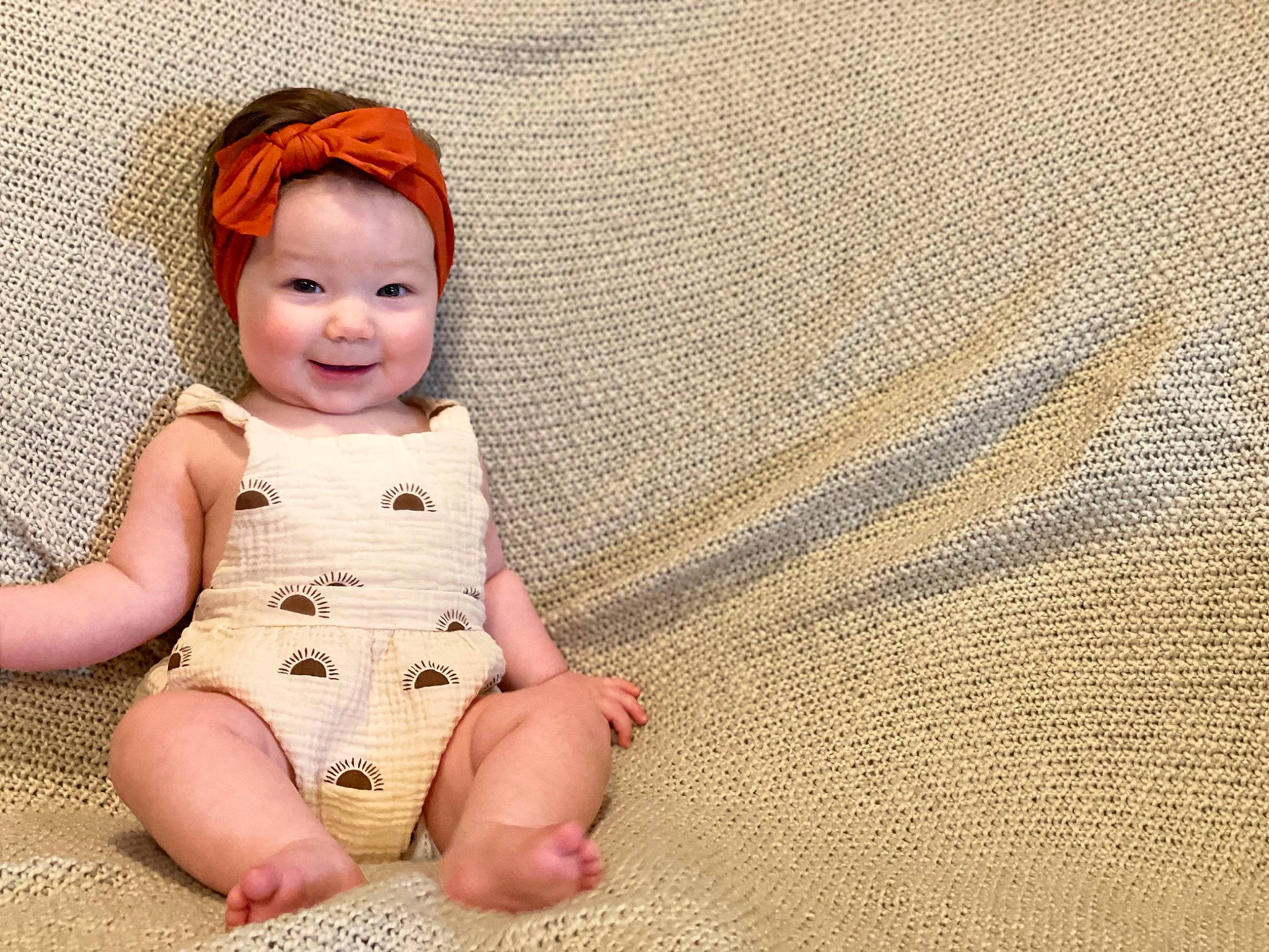 Chandler joined the competition — help win amazing prizes! baby, baby_toddler_clothing, barefoot, comfort, dress, eye, face, flooring, happy, head, headwear, human_body, joy, leg, outerwear, person, skin, sleeve, smile, thigh
