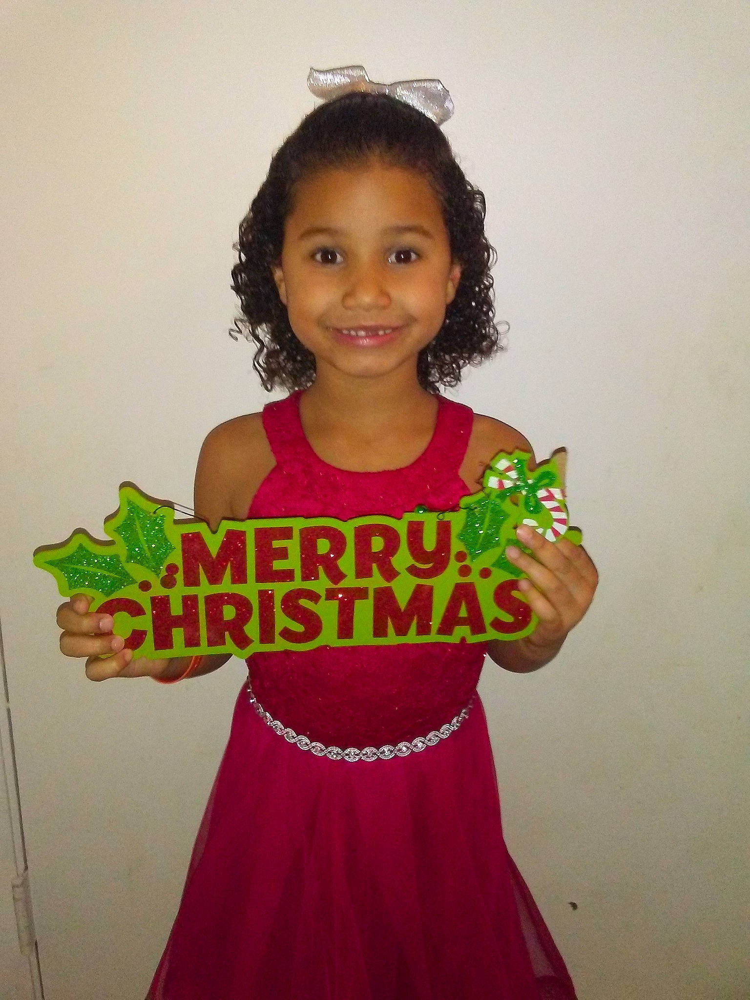 Aryah is registered to the contest to win money with this photo: child, clothing, dance_dress, day, dress, fashion_accessory, girl, hair, hair_accessory, hairstyle, happiness, joint, joy, person, pink, product, shoulder, skin, smile, standing