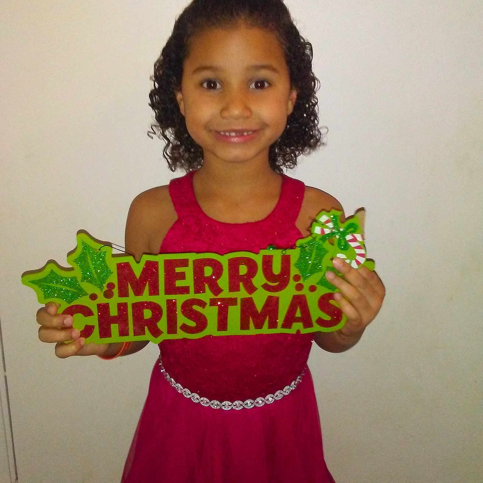 Aryah is registered to the contest to win money with this photo: child, clothing, dance_dress, day, dress, fashion_accessory, girl, hair, hair_accessory, hairstyle, happiness, joint, joy, person, pink, product, shoulder, skin, smile, standing