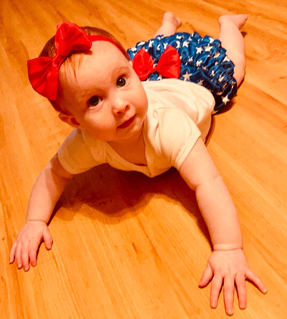 Adalie joined the competition — help win amazing prizes! baby, baby_toddler_clothing, barefoot, fawn, finger, floor, flooring, foot, happy, hardwood, human_leg, knee, leg, person, skin, smile, thigh, thumb, toddler, wood