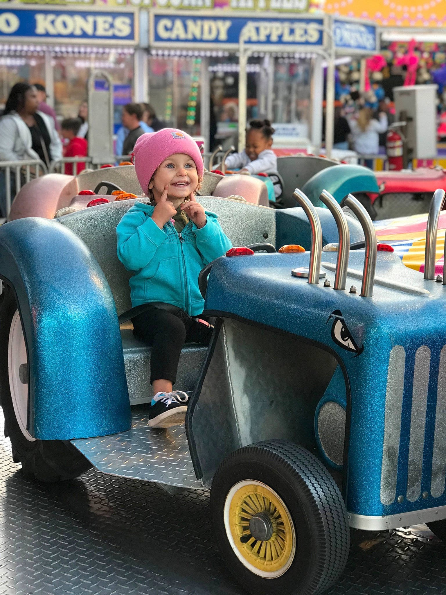 Emerlyn joined the competition — help win amazing prizes! auto_part, automotive_design, automotive_exterior, automotive_tire, automotive_wheel_system, blue, blurred, classic, electric_blue, fun, green, hat, headwear, joy, mode_of_transport, motor_vehicle, person, public_space, riding_toy, t_shirt