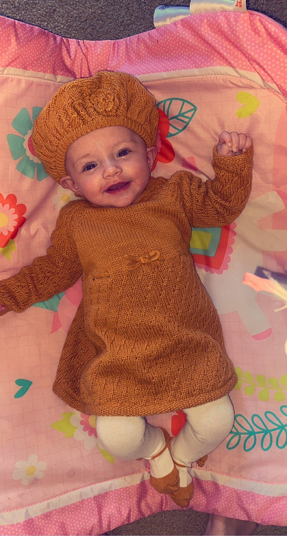 Myah is registered to the contest to win money with this photo: baby, baby_toddler_clothing, cheek, dress, eye, face, head, headwear, human_body, leg, lip, nose, organ, outerwear, person, pink, product, skin, sleeve, smile
