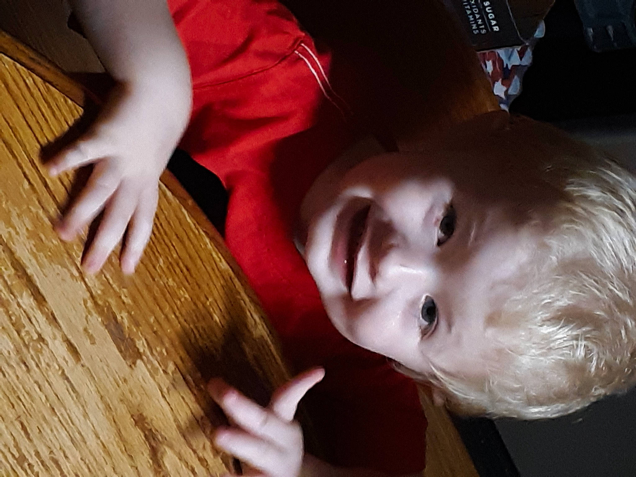 Garrett is registered to the contest to win money with this photo: black_hair, child, eyelash, finger, flash_photography, fun, happy, hardwood, joy, lip, mouth, nail, neck, nose, orange, person, plant, skin, toddler, tree