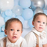 Amir And Liam joined the competition — help win amazing prizes! toddler, child, baby, boy, portrait, balloons, blue, silver, bow_tie, suspenders, white_shirt, cute, indoor, celebration, siblings, face, fashion, smile, curious, studio