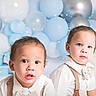 toddler, child, baby, boy, portrait, balloons, blue, silver, bow_tie, suspenders, white_shirt, cute, indoor, celebration, siblings, face, fashion, smile, curious, studio
