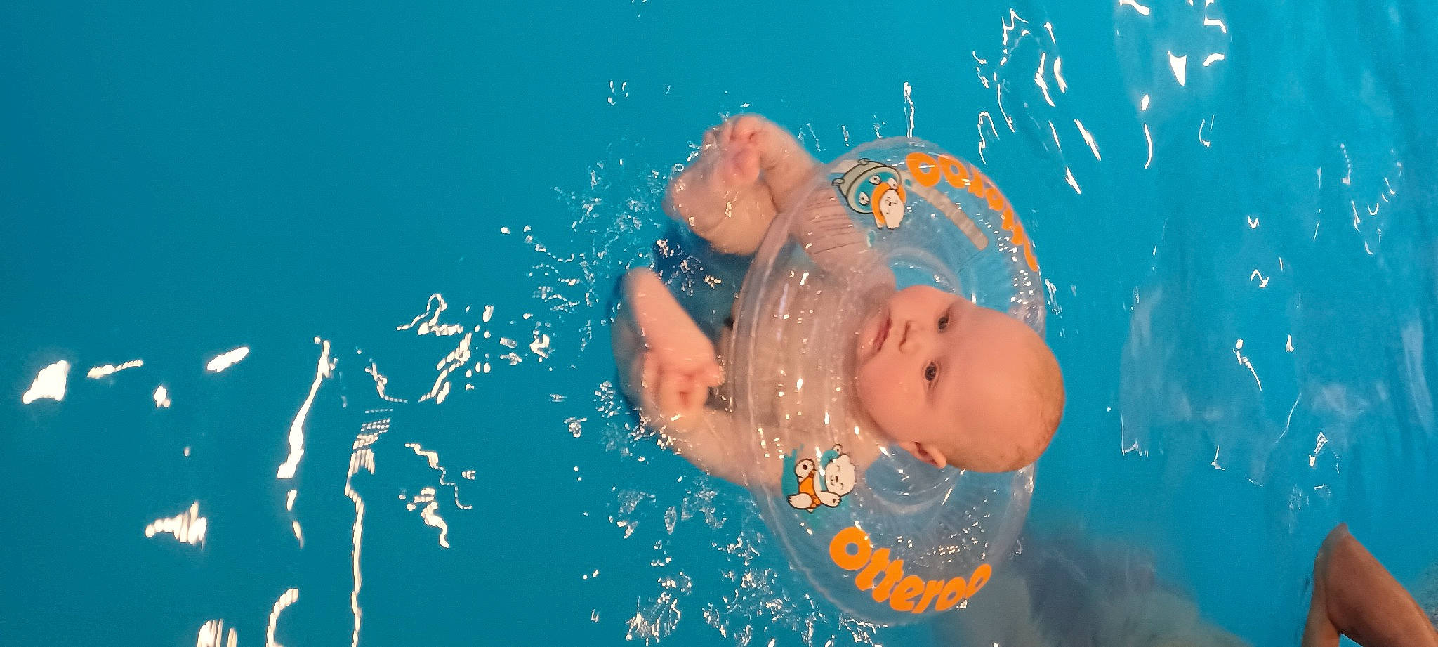 Jakobe is registered to the contest to win money with this photo: aqua, azure, bathing, chest, child, electric_blue, fluid, fun, gesture, happy, leisure, liquid, liquid_bubble, person, personal_protective_equipment, recreation, swimmer, swimming_pool, underwater, vertebrate
