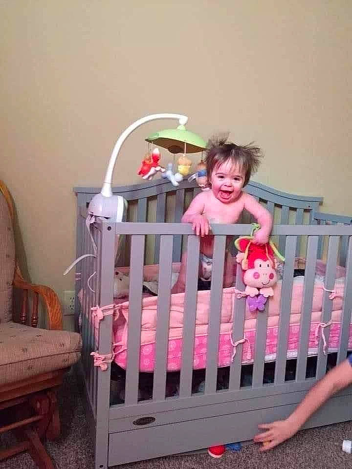 Emily is registered to the contest to win money with this photo: baby, baby_products, baby_safety, baby_toddler_clothing, bed, comfort, cradle, happy, hardwood, infant_bed, linens, magenta, nursery, person, pink, product, shorts, sleeve, smile, toddler