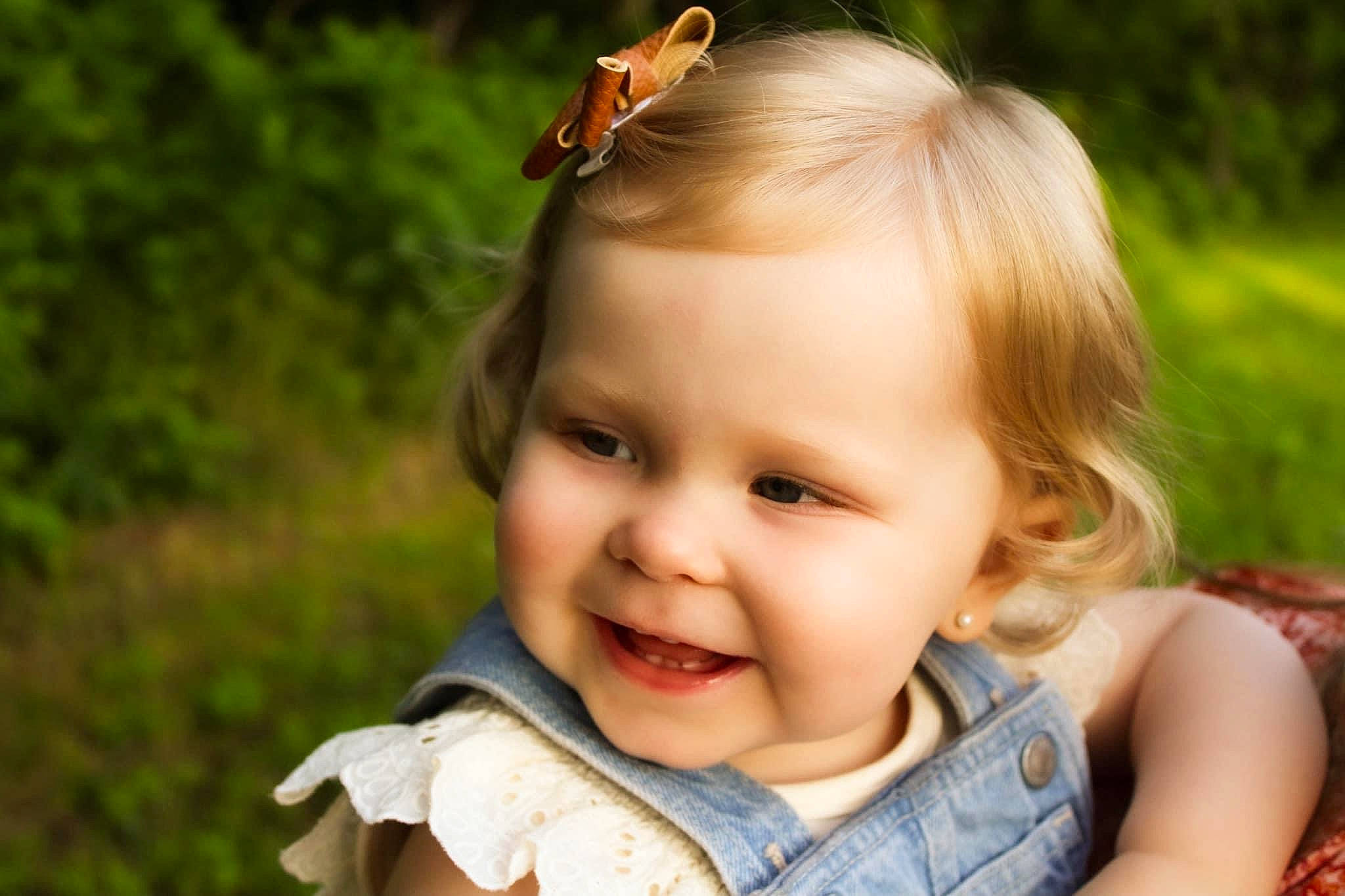 Avery joined the competition — help win amazing prizes! arthropod, baby, baby_toddler_clothing, eye, eyelash, face, happy, insect, iris, joy, leaf, lip, nature, nose, people_in_nature, person, plant, pollinator, skin, smile