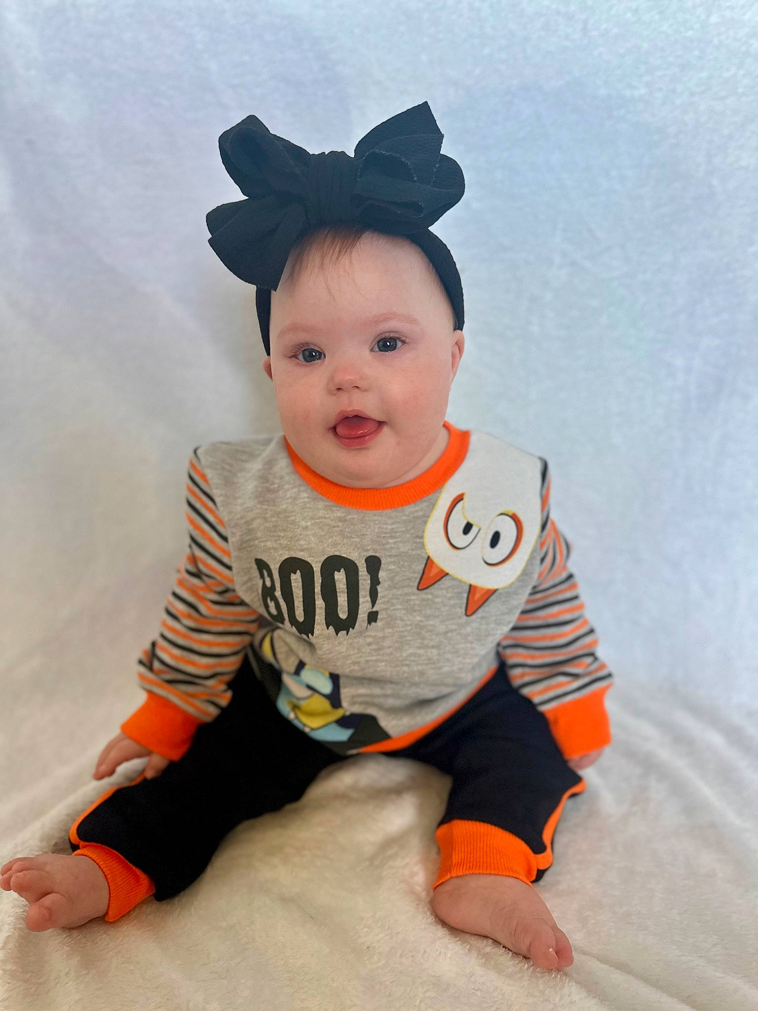 Evangeline is registered to the contest to win money with this photo: baby, baby_toddler_clothing, cap, child, costume_accessory, costume_hat, face, fun, happy, hat, outerwear, pattern, person, sitting, sleeve, smile, sportswear, t_shirt, toddler