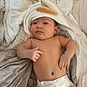 baby, blanket, casual, child, comfort, cozy, cute, diaper, expression, face, hooded_towel, indoors, infant, lying_down, newborn, relaxed, resting, skin, soft, towel