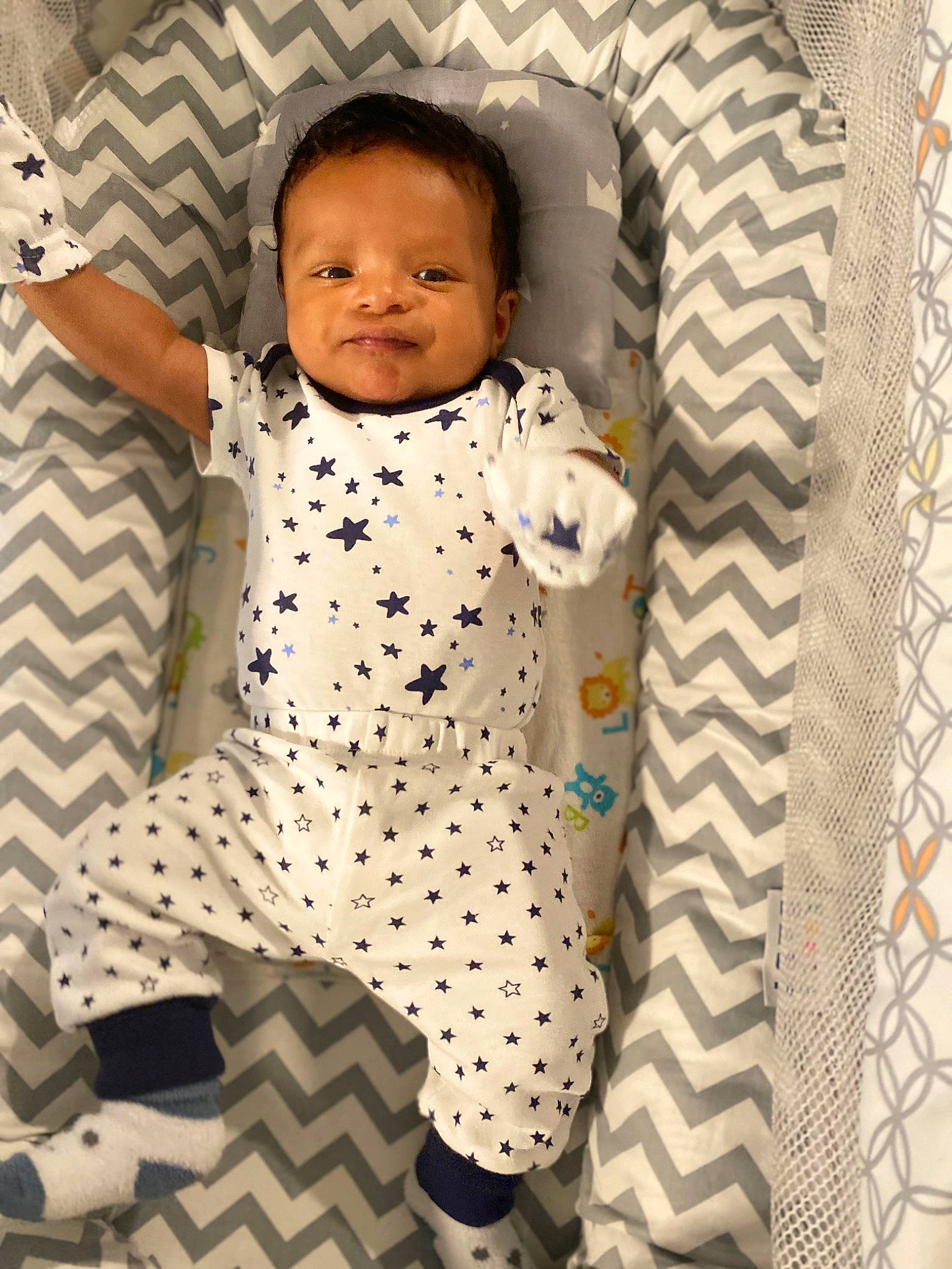 Jayden joined the competition — help win amazing prizes! baby, baby_products, baby_toddler_clothing, child, collar, comfort, eye, face, flooring, happy, linens, pattern, person, polka_dot, product, room, sitting, sleeve, smile, t_shirt