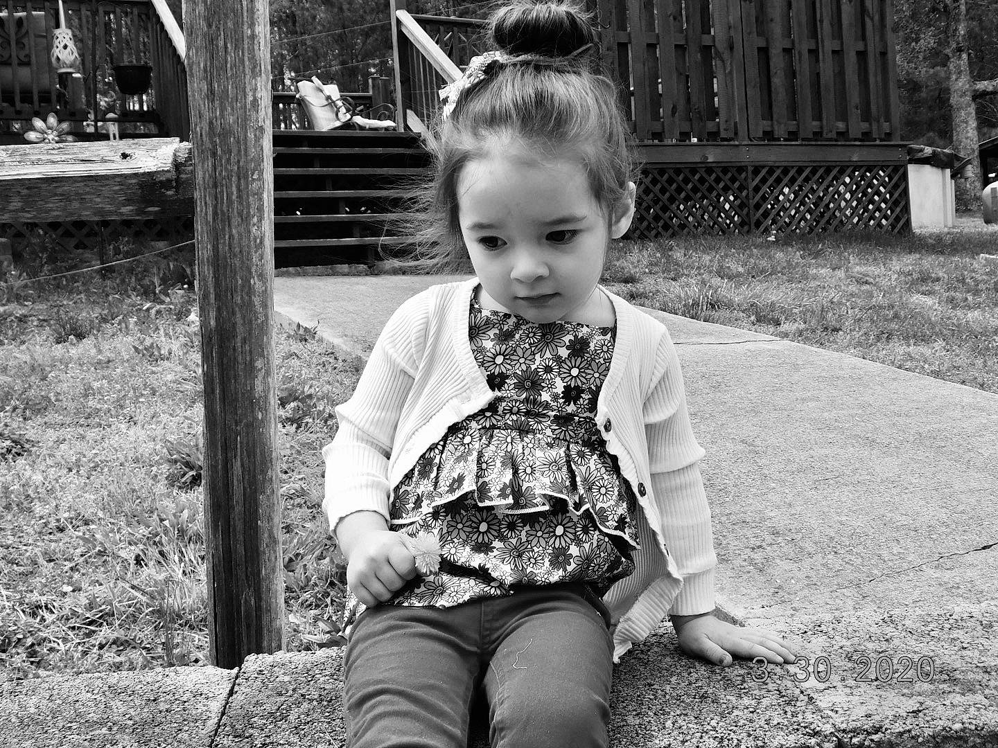 Leigha is registered to the contest to win money with this photo: black_and_white, child, family, grass, monochrome, monochrome_photography, people, person, photograph, photography, plant, sitting, smile, snapshot, style, toddler