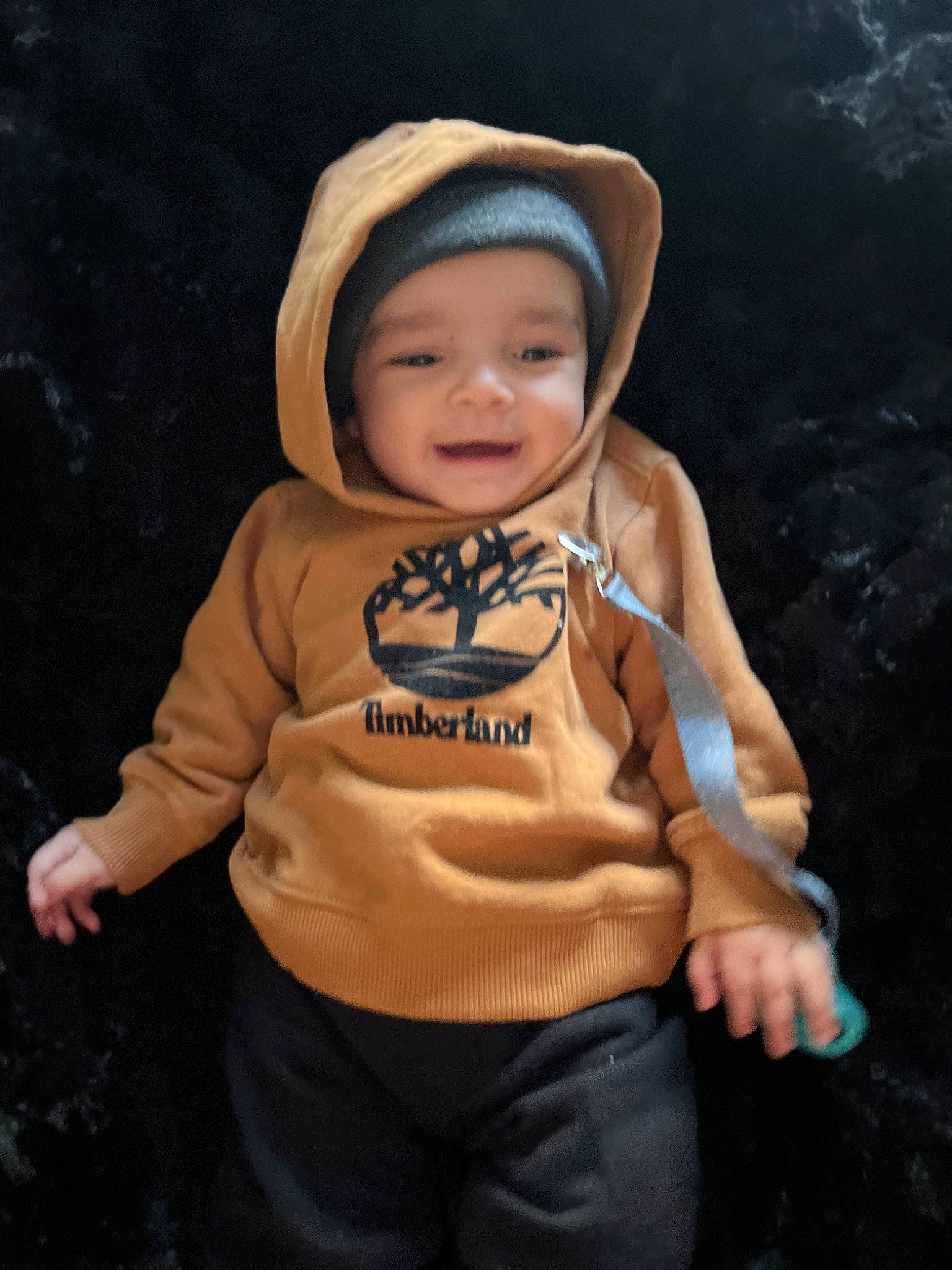 Jaziah joined the competition — help win amazing prizes! baby, baby_toddler_clothing, baseball_cap, cap, child, fashion_accessory, flash_photography, fun, gesture, happy, hat, headgear, headwear, human_body, joy, person, personal_protective_equipment, sitting, sleeve, smile