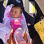 baby, sleeping, pink_blanket, pink_outfit, car_seat, chicco, infant, child, sunlight, shadow, soft_texture, cozy, resting, cute, newborn, foot, hand, head, portrait, outdoor