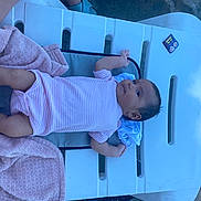Amelia is registered to the contest to win money with this photo: baby, blanket, casual, child, cushion, cute, infant, infant_clothing, lounge_chair, lying_down, outdoor, peaceful, pink_onesie, plastic_chair, relaxing, small_toy, soft_texture, summer, sunlight, toy