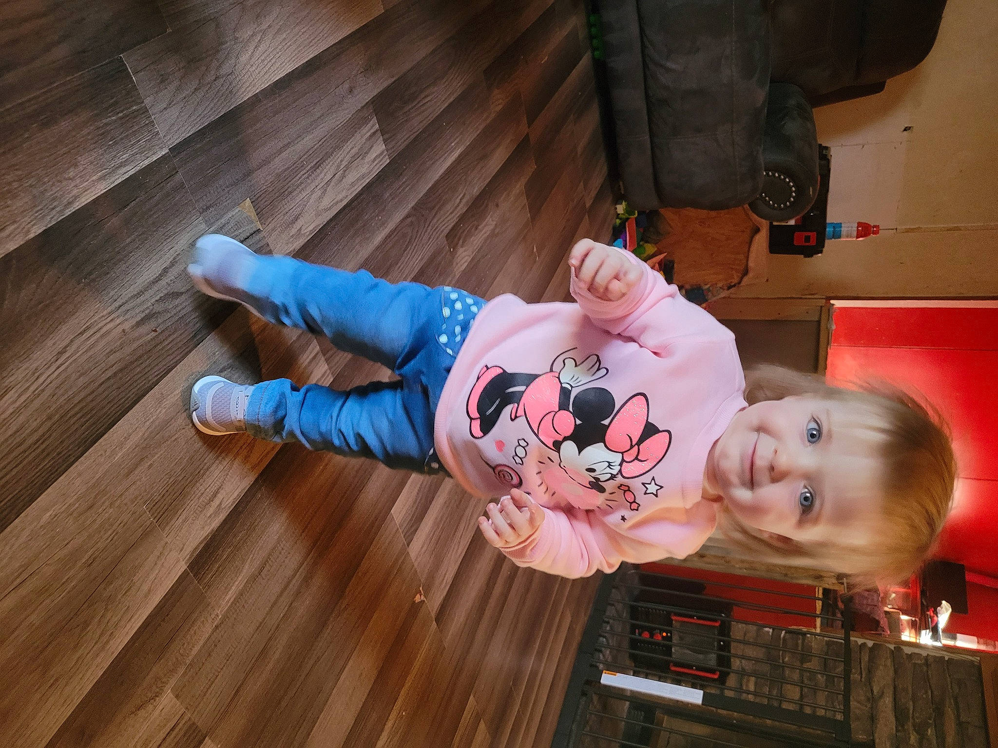Scarlett is registered to the contest to win money with this photo: baby, baby_toddler_clothing, cheek, child, comfort, flooring, fun, happy, hardwood, joy, laminate_flooring, person, plank, room, sitting, smile, sock, toddler, varnish, wood