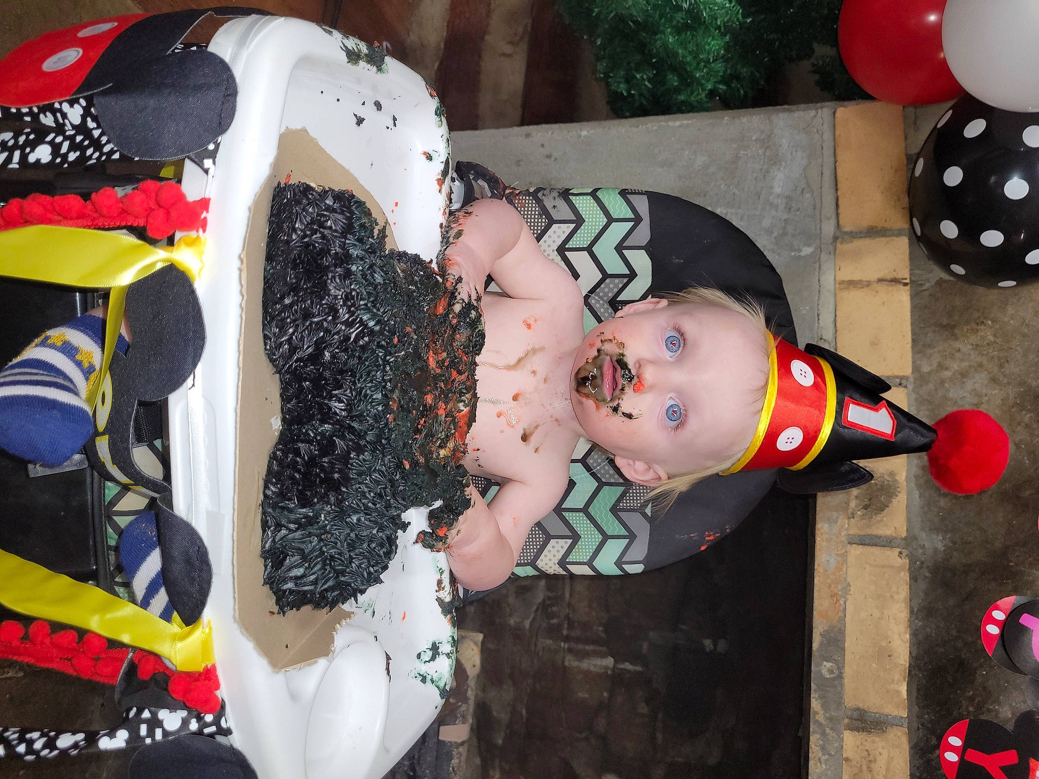 Bryson is registered to the contest to win money with this photo: baby, baby_products, baby_toddler_clothing, balloon, black, carmine, child, costume, design, event, fun, party_supply, pattern, person, textile, toddler, white