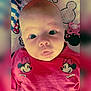 baby, infant, face, eyes, mouth, pink_shirt, minnie_mouse, pacifier, blanket, cute, child, portrait, closeup, expression, lying_down, skin, head, clothing, pattern, adorable