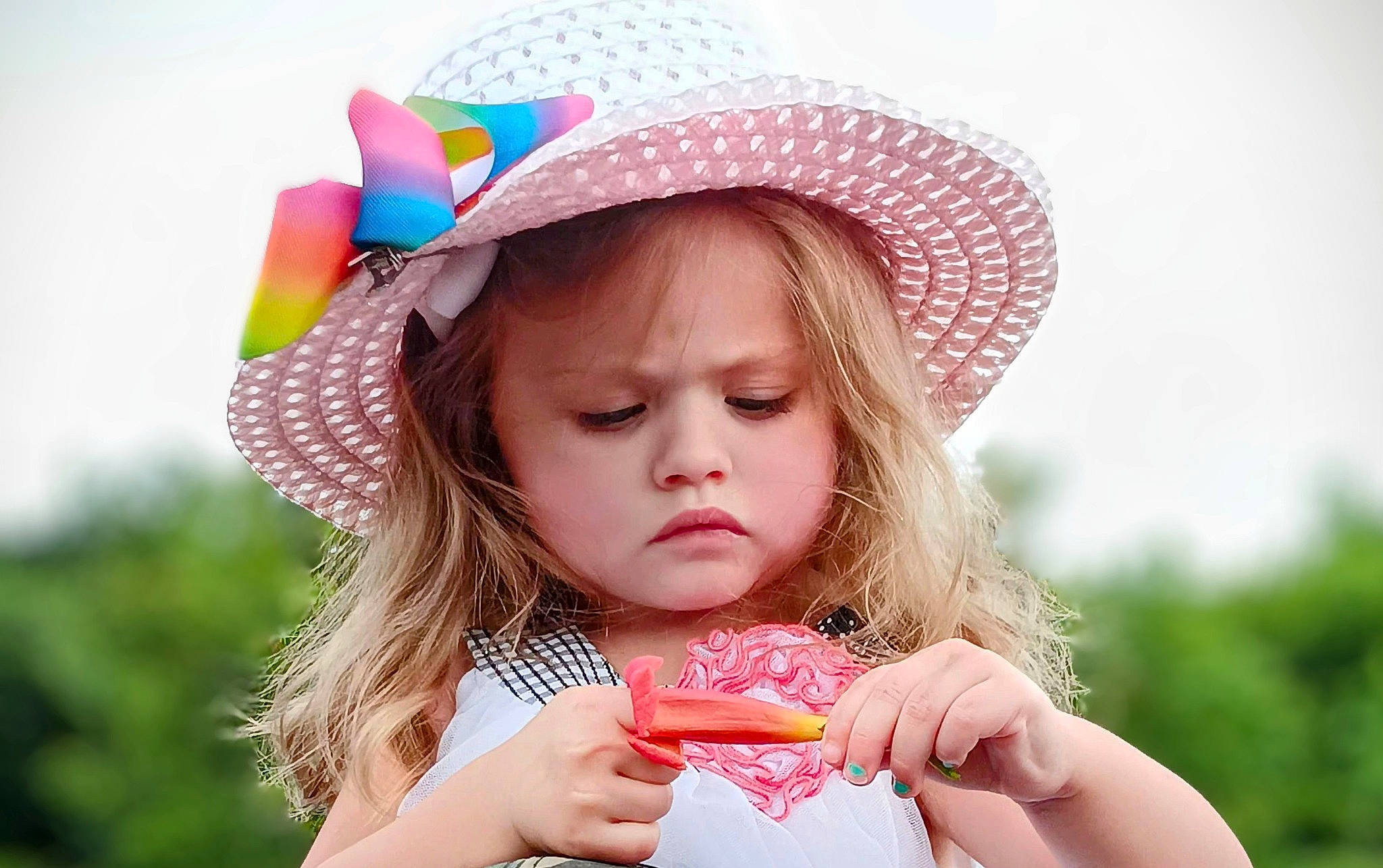 Abigail is registered to the contest to win money with this photo: beauty, brown_hair, child, costume_hat, dress, facial_expression, fruit, fun, grass, happy, hat, headgear, lip, people_in_nature, person, pink, plant, skin, sorrow, summer