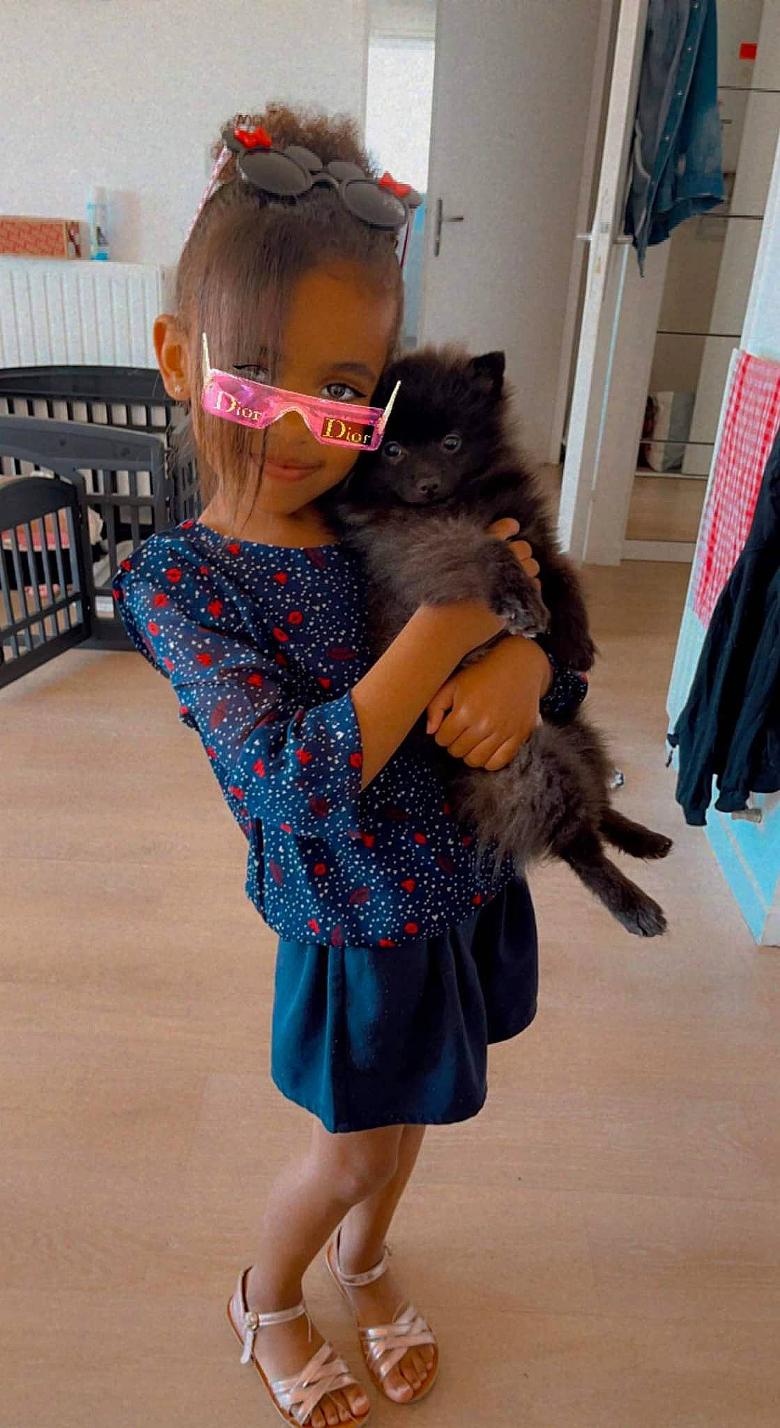 Luna a rejoint le concours — aidez-le/la à gagner de superbes lots ! child, dress, eyewear, fashion_design, fawn, flooring, fun, hair, hairstyle, head, headgear, long_hair, neck, person, pink, shoulder, sleeve, thigh, toddler, trunk