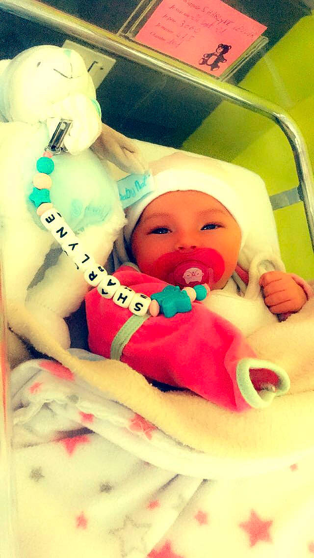 Sharlyne participe au concours pour gagner de l'argent avec cette photo : baby, baby_products, baby_safety, baby_sleeping, chest, child, comfort, event, finger, fun, happy, headwear, leisure, linens, mouth, nail, person, room, skin, textile