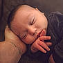 baby, sleeping, hand, face, arm, tattoo, clothing, closeup, infant, peaceful, resting, skin, person, newborn, cute, portrait, soft, warm, comfort, child