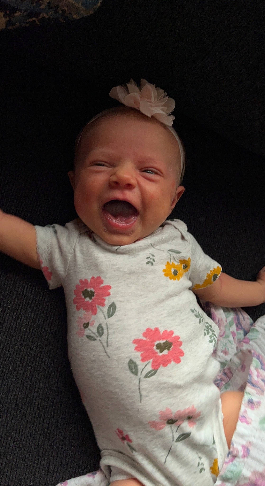 Kynlee is registered to the contest to win money with this photo: baby, baby_toddler_clothing, cheek, child, chin, comfort, eye, finger, fun, gesture, happy, human_body, lip, mouth, nose, person, pink, skin, sleeve, smile