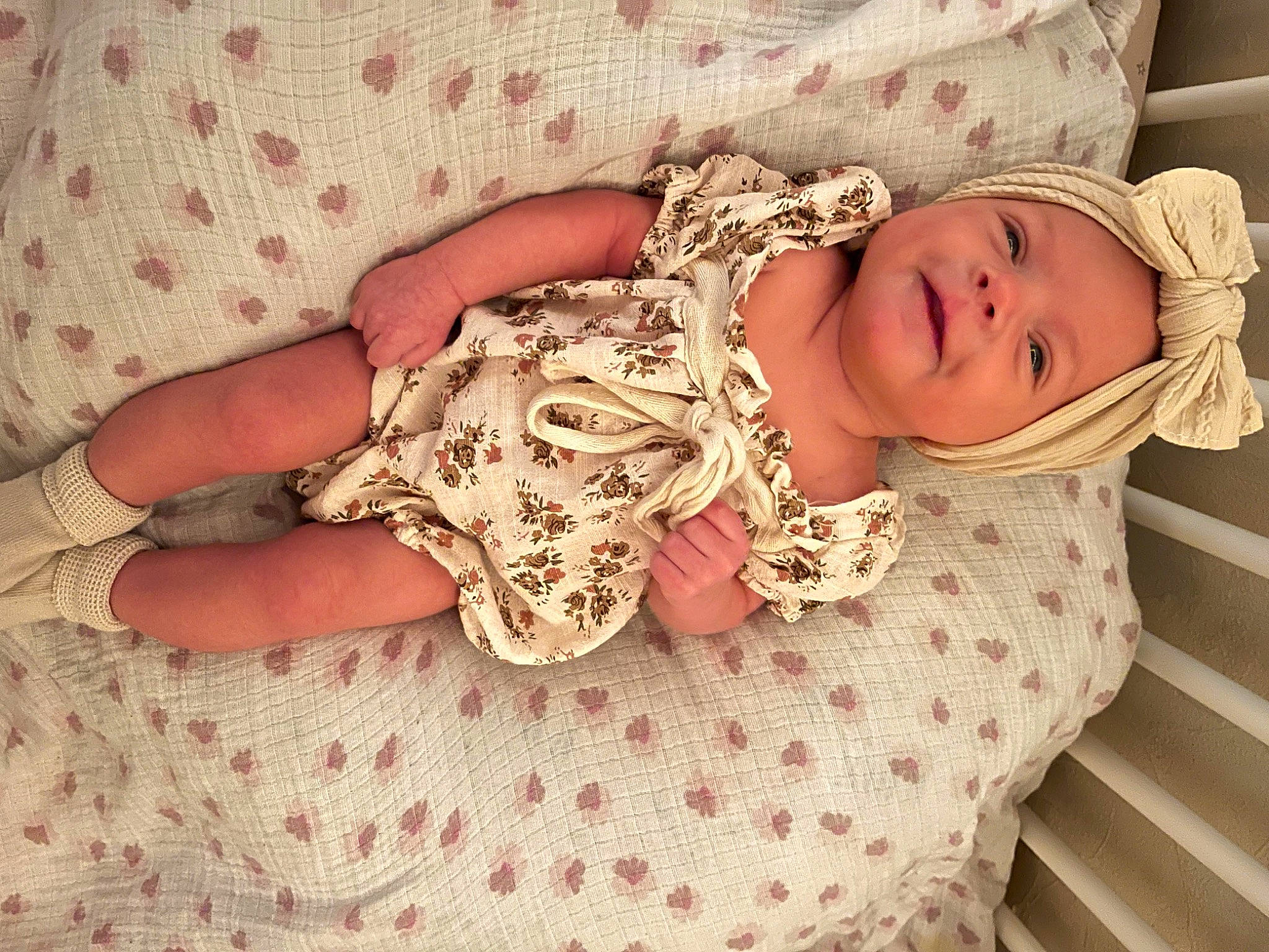 Kynlee is registered to the contest to win money with this photo: baby, baby_products, baby_safety, baby_sleeping, baby_toddler_clothing, bedding, child, comfort, fashion_accessory, headwear, human_leg, infant_bed, linens, nail, pattern, person, sleeve, textile, toddler, visual_arts