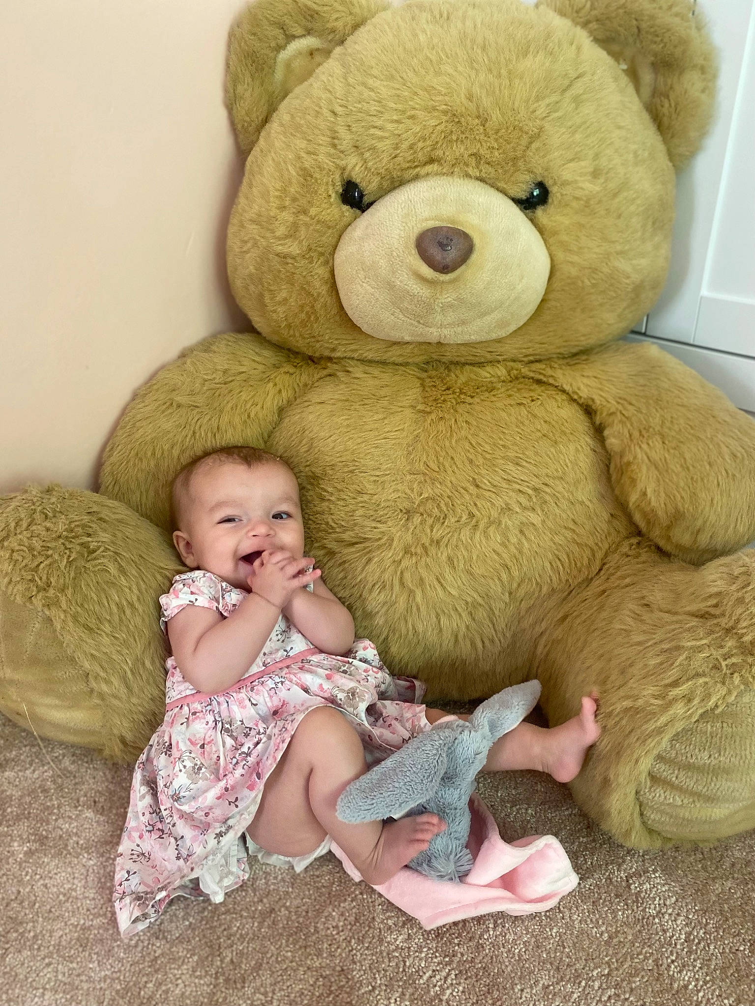 Arabella is registered to the contest to win money with this photo: baby, baby_toddler_clothing, baby_toys, brown_bear, cheek, child, comfort, fur, happy, head, linens, mammal, person, plush, sitting, skin, stuffed_toy, teddy_bear, terrestrial_animal, toddler