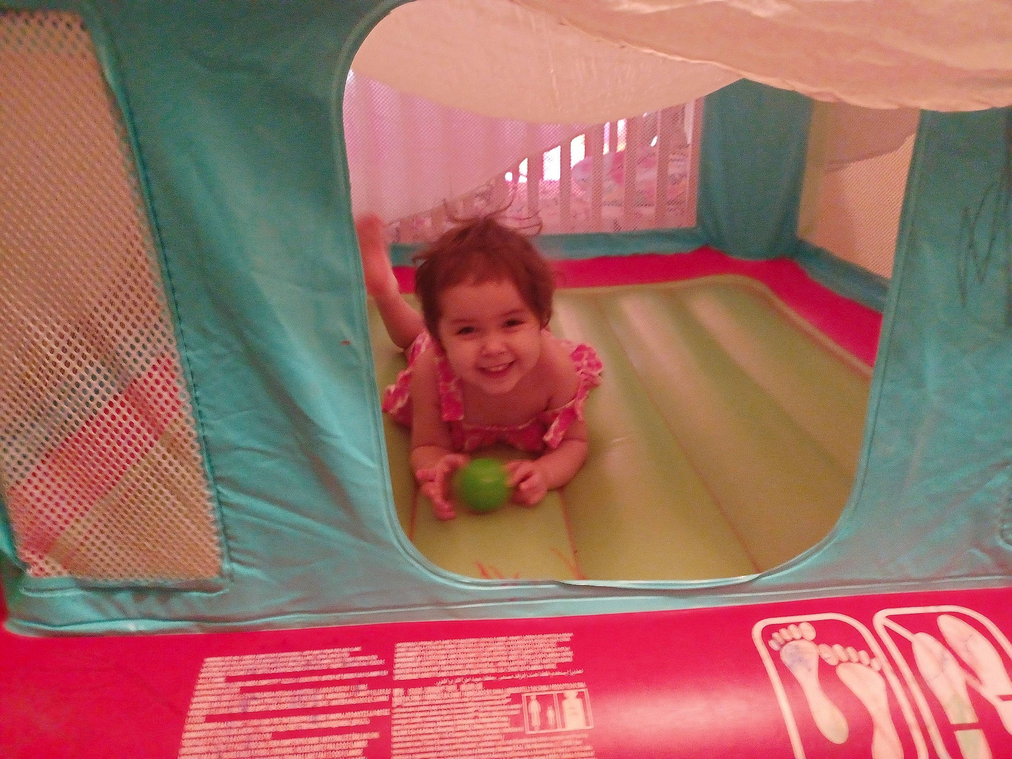 Viviana joined the competition — help win amazing prizes! baby, baby_toddler_clothing, child, chute, comfort, fun, inflatable, joy, leisure, magenta, outdoor_play_equipment, person, pink, play, playground, playhouse, recreation, red, room, smile