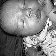 Miyah is registered to the contest to win money with this photo: arm, baby, birth, black_and_white, child, face, finger, forehead, hand, head, lip, monochrome, monochrome_photography, mouth, muscle, nose, photograph, photography, skin, sleep
