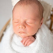 Albie joined the competition — help win amazing prizes! newborn, baby, sleeping, wrapped, blanket, white, soft, peaceful, infant, closeup, hand, face, skin, portrait, cute, resting, cozy, young, child, tender