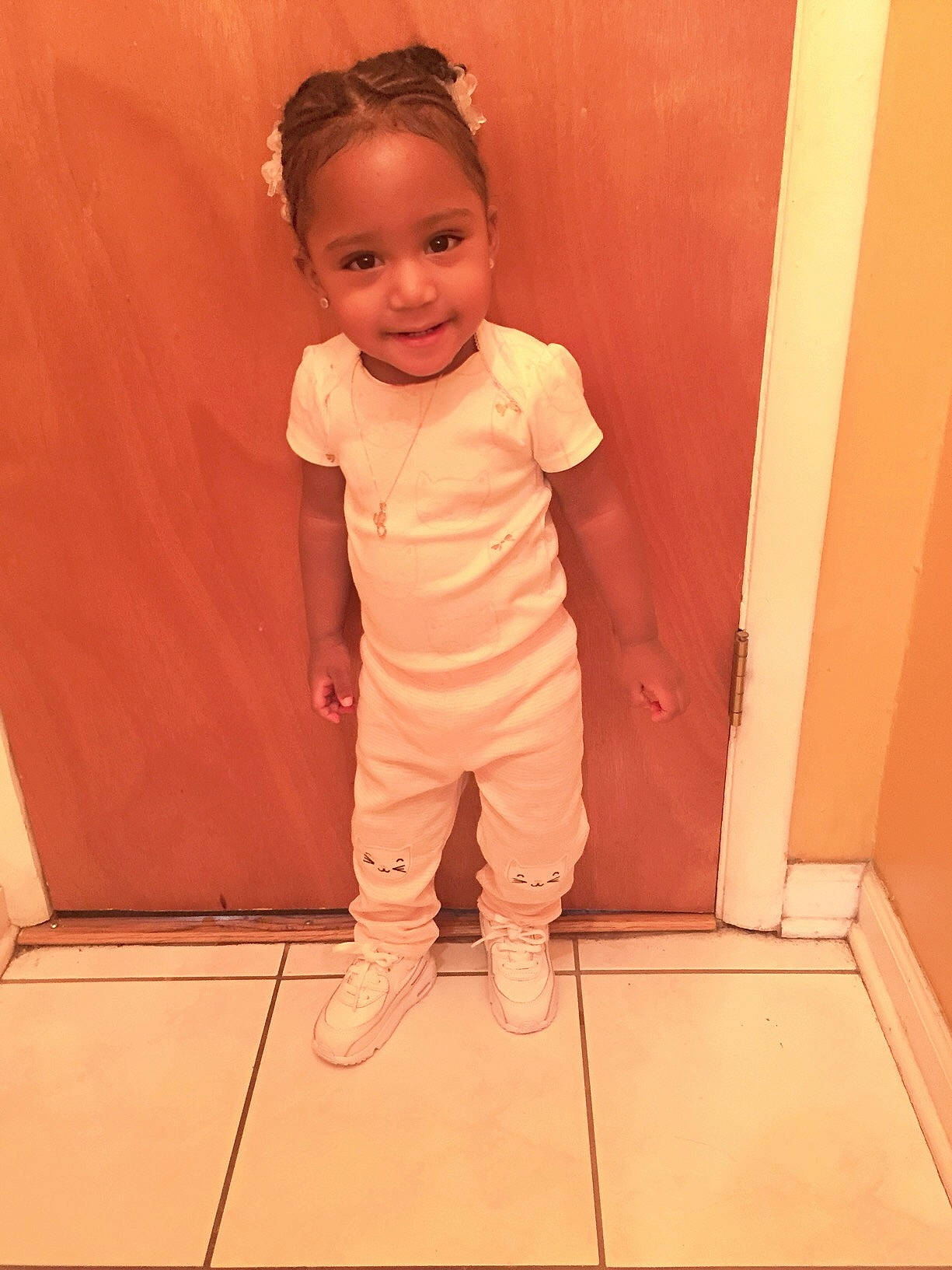 Carley is registered to the contest to win money with this photo: child, floor, flooring, person, standing, toddler