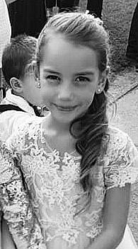 Iliana participe au concours pour gagner de l'argent avec cette photo : black_and_white, chignon, child, child_model, dress, fashion, forehead, gesture, hair, hairstyle, joy, long_hair, monochrome, monochrome_photography, person, photograph, photography, sibling, smile, style