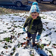 Memphis Ridge Kinder joined the competition — help win amazing prizes! child, snow, winter_clothing, hat, gloves, jacket, pants, boots, outdoor, daylight, car, grass, leaf, footprint, cold_weather, parked_vehicle, street, person, young_child, winter