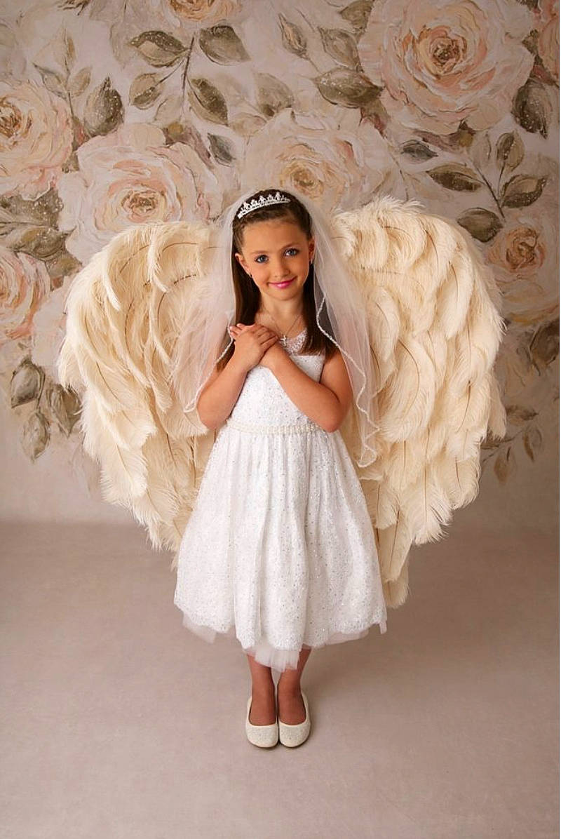 Kaelyn is registered to the contest to win money with this photo: bridal_accessory, bridal_clothing, bridal_party_dress, dress, embellishment, fashion_design, flash_photography, flooring, formal_wear, gown, happy, headgear, headpiece, joy, long_hair, person, petal, picture_frame, pink, shoe