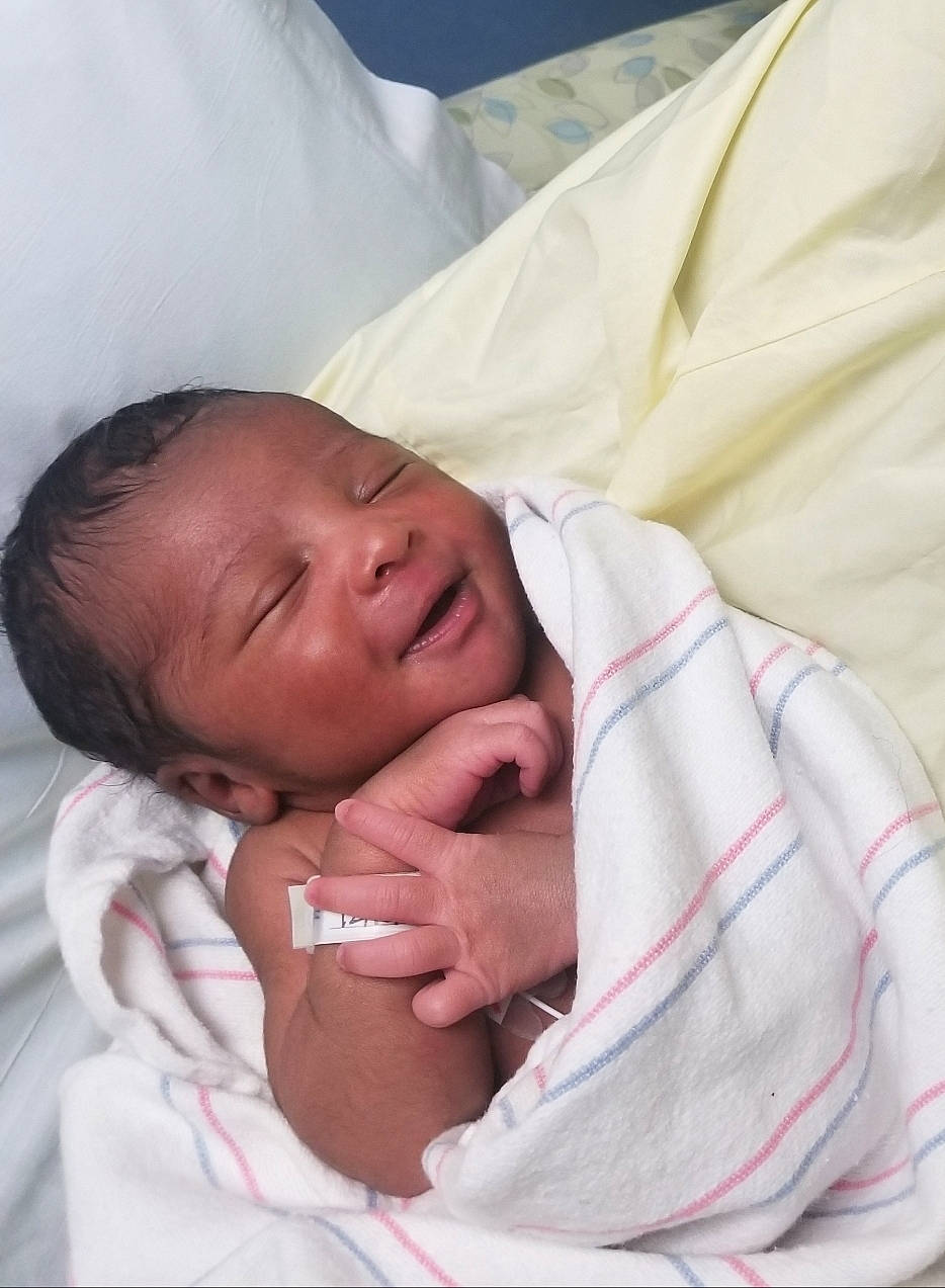 Xzavier is registered to the contest to win money with this photo: bed, bedtime, child, childbirth, girl, infant, nose, person, product, sleep