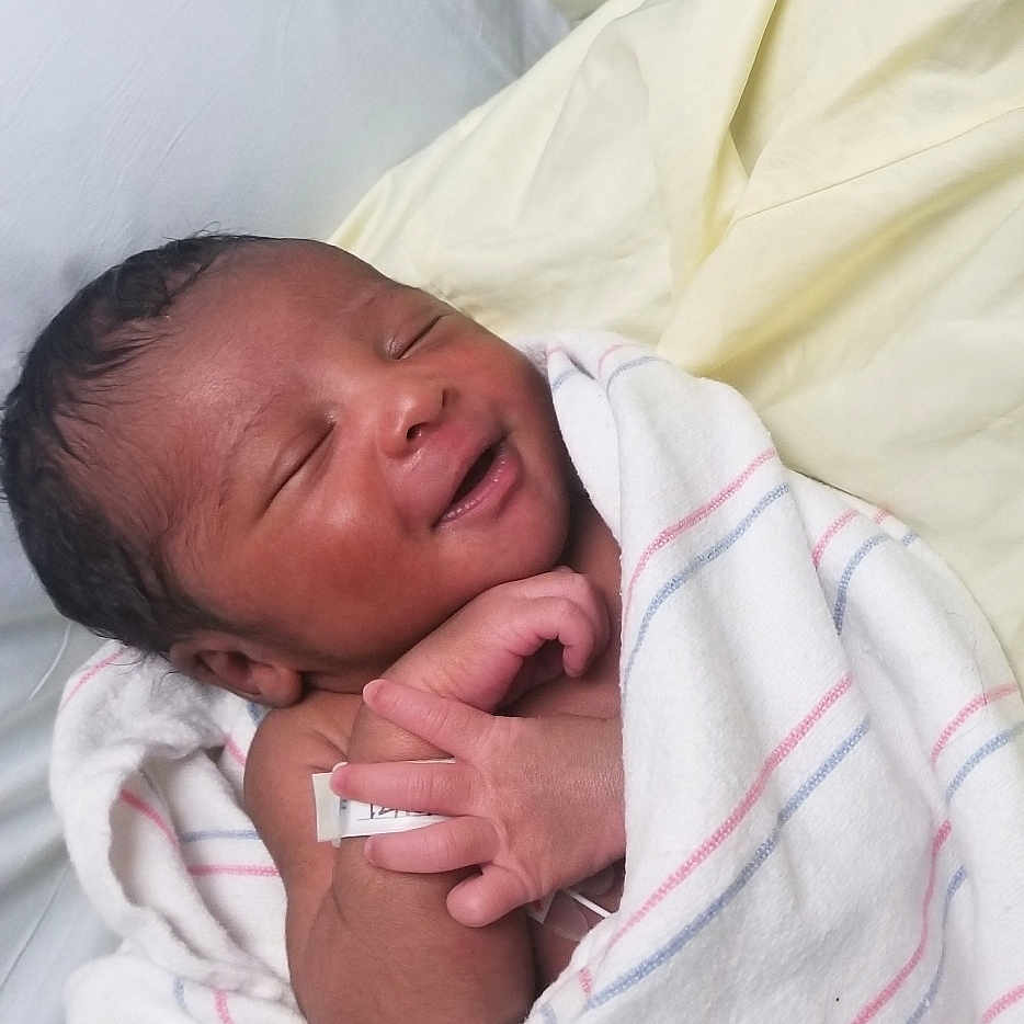 Xzavier is registered to the contest to win money with this photo: bed, bedtime, child, childbirth, girl, infant, nose, person, product, sleep