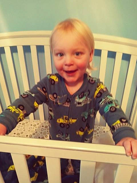 Alexander is registered to the contest to win money with this photo: baby, baby_safety, baby_toddler_clothing, chair, cheek, child, chin, eye, fun, happy, iris, joy, nursery, person, sitting, skin, sleeve, smile, t_shirt, table