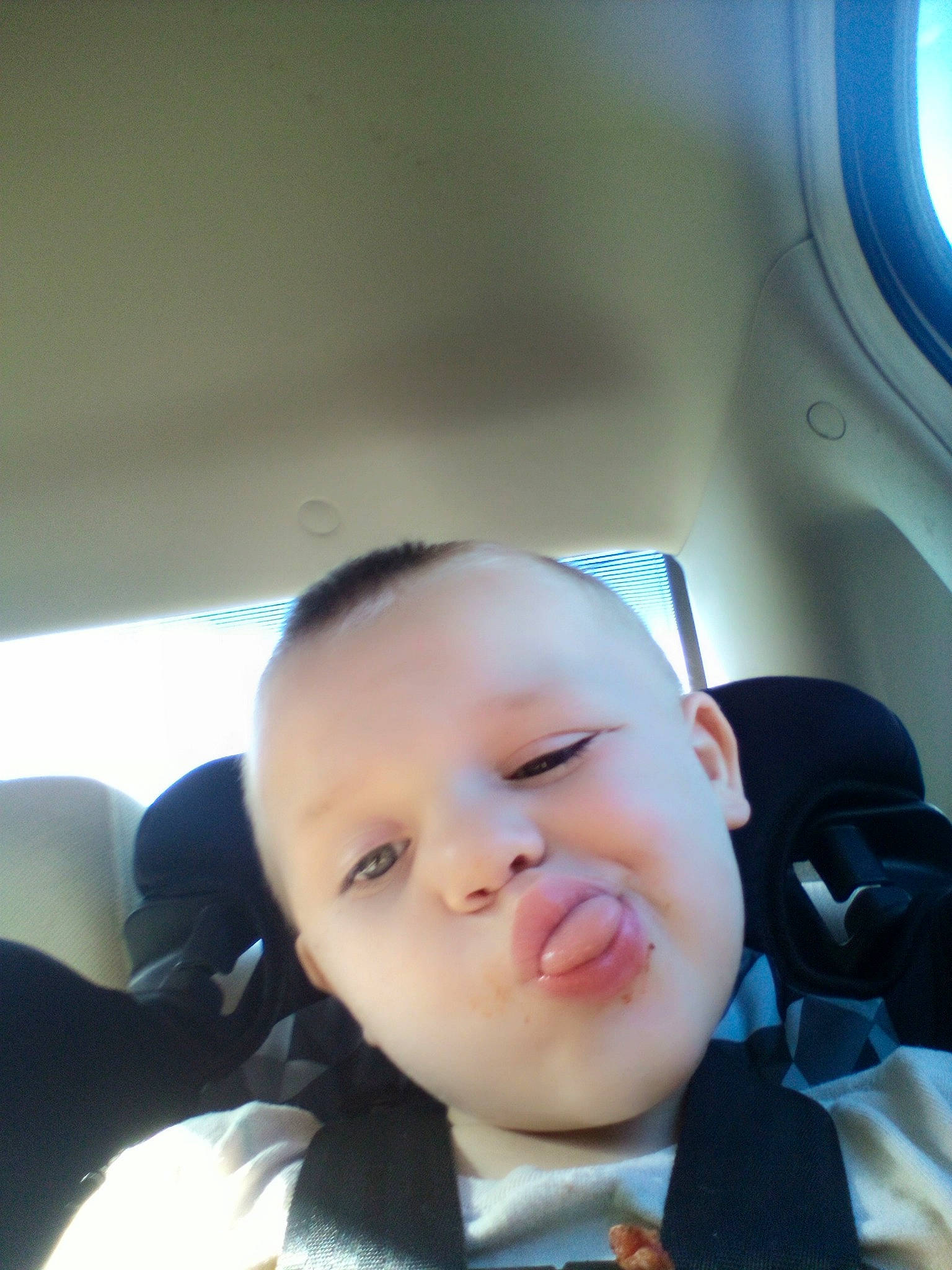 Owen is registered to the contest to win money with this photo: auto_part, automotive_design, baby, baby_toddler_clothing, car_seat, cheek, child, chin, comfort, eyebrow, eyelash, family_car, fun, head_restraint, luxury_vehicle, mouth, nose, person, tie, toddler