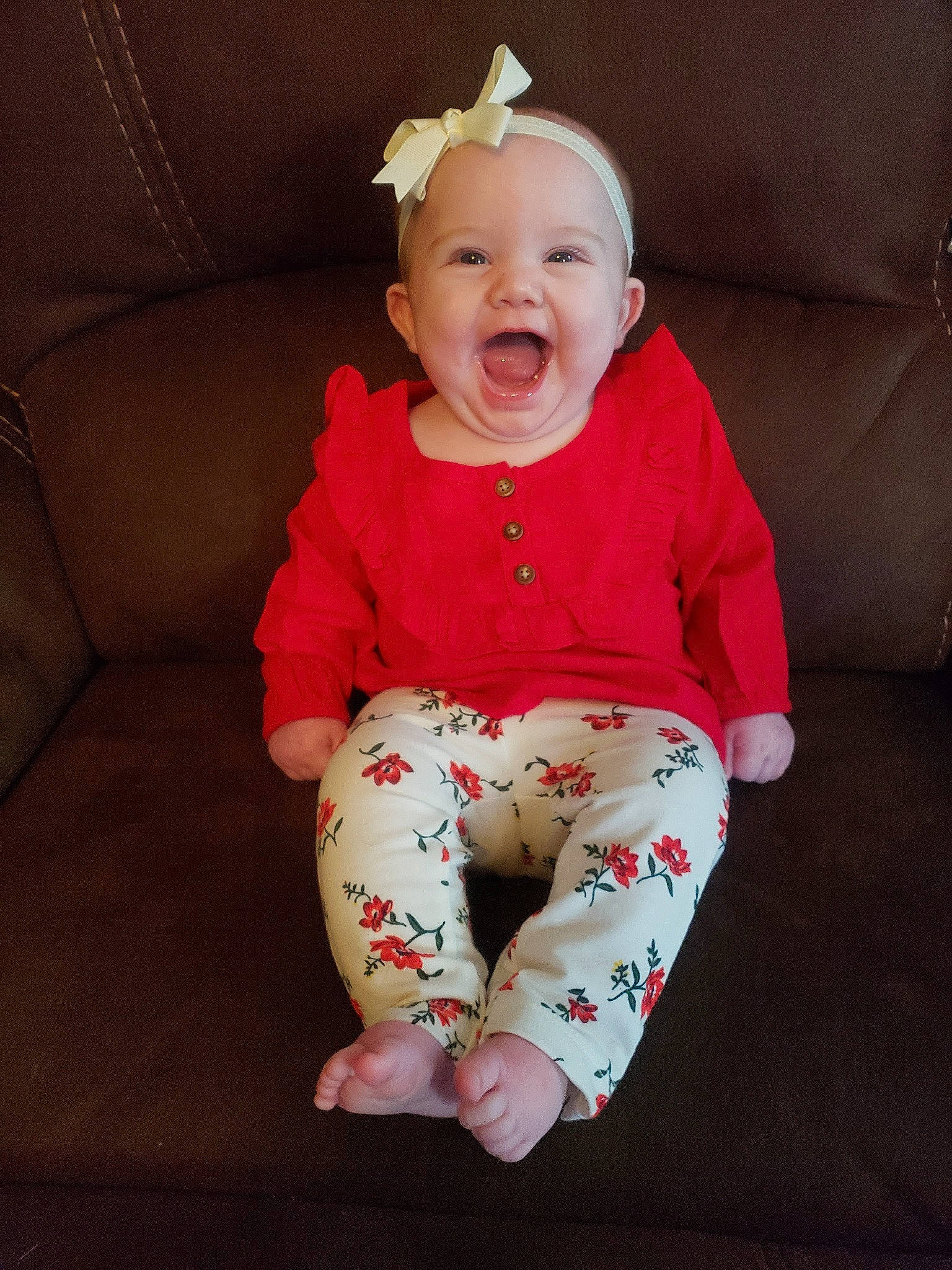 Brooklyn is registered to the contest to win money with this photo: cheek, child, facial_expression, fun, girl, hair_accessory, happiness, infant, laughter, leg, outerwear, person, pink, product, red, sitting, skin, smile, standing, textile
